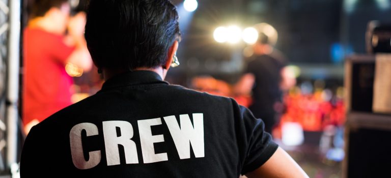 Behide Of the concert crew on stage Behide Of the concert crew on stage